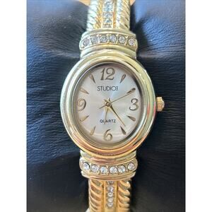 Studio Time Gold Tone Women’s Cuff Watch